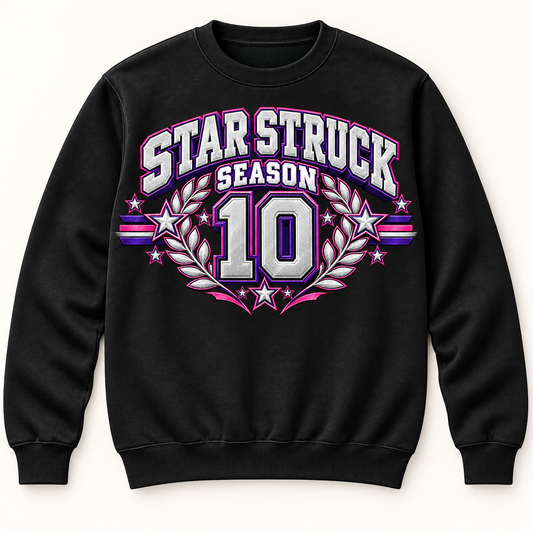Black crewneck with centered Star Struck Season above 10 Pink Purple design; digital mockup, printed metallic effect